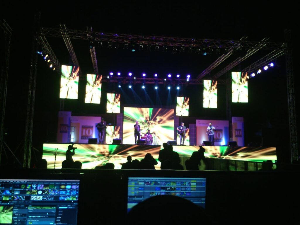 "Best corporate event stage design in Hyderabad with LED lighting and creative setup"